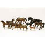 A collection of ten Beswick model horses, and one other similar