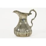 A Victorian silver milk jug, by John Figg, 1851, 7.5oz