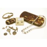 A collection of costume jewellery to include a pair of gilt metal simulated pearl star cluster