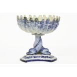 A 19th century Worcester bon bon dish, the castelated bowl raised on triple dolphin support, 13cm