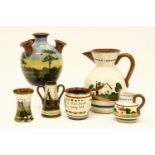 A collection of mottowares, to include cups, saucers, egg cups, jugs and teapots, etc.