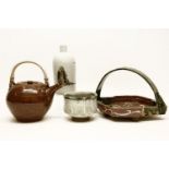 A studio beaker, 10cm high, a basket, a bottle vase, 20cm, and a teapot, 22cm high