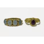 A 9ct gold four stone cabochon aquamarine ring, and a gold cabochon Roman style ruby ringruby 6.