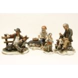 Four Naples Capodimonte figures, including the Tramp with Dog, Fisherman and Tramp on bench