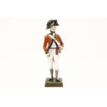 A Sitzendorf porcelain model of a soldier entitled 'Offices 3rd Guards', 1792, (af), 26cm high