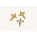 An 18ct white gold diamond cross pendant, and two 18ct gold diamond cross pendantswhite 0.89gcross