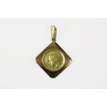 Iran, Half Pahlavi, 1963, in an 18ct gold pendant mount, approximately 5.7 grams