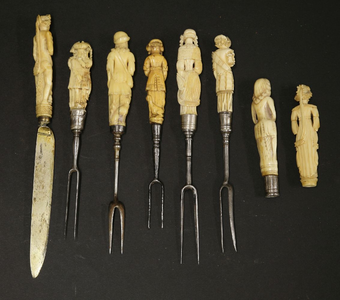 Eight carved ivory figural cutlery handles,early 17th century, five with two-pronged forks, one a - Image 2 of 2