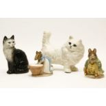 Two Beswick cats, and two Beswick Beatrix potter figures