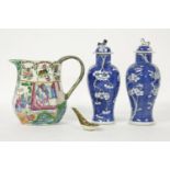 A Canton jug, with a restored handle, a spoon, and a pair of Chinese prunus vases and covers, 21cm