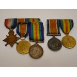 A First World War medal group comprising of a British war medal, Victoria medal and 1914 Star