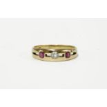 A gold three stone diamond and ruby pierced ring, marked 18ct, size T½ 4.32g