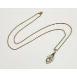An Art Deco gold aquamarine drop pendant on belcher chain, marked 9ct4.02g