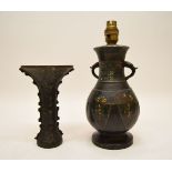 An antique Chinese bronze and cloisonne vessel of archaitic form, together with a stand, the largest