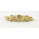 A 15ct gold two row bar brooch set with ruby and diamond, raised vertical bar flanked by two