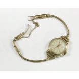 A ladies 9ct gold Derrick mechanical watch, on a later 9ct Brazilian snake bracelet, watch with