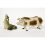 A Royal Copenhagen Sea Lion11.5cm high and a continental figure of a boar 21.5cm long