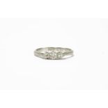 A three stone diamond ring, stamped plat, size L3.08g