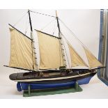 A model two masted schooner 'Lester III', fully rigged, with a painted black and blue hull, 104cm