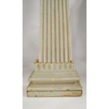 A large fluted and grey painted column of classical design, approximately 272cm high