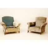 A pair of Howard style deep armchairs, on square tapering legs and brass castors, the back leg