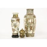 Two Japanese Satsuma vases, 20th century, with figures and panels of peony, fan designs, 21.5cm