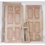 Three large stripped pine panels, with egg and dart moulding, the largest 246 x 140cm, together with