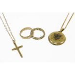 A 9ct gold cross on chain, marked 9ct, a 9ct gold wedding ring, a gold white stone eternity ring,