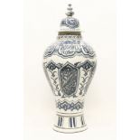 A Persian baluster jar and cover, decorated in underglaze blue, 60cm high
