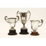 Two silver trophies and a christening mug, all engraved