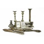 A silver candlestick, Sheffield 1913, and silver plated items, modern silver strut clock, etc