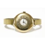 A gentleman's 9ct gold Benson half hunter strap watch, with later expanding bracelet