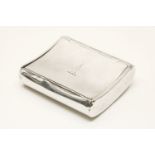 A silver tobacco box, maker's mark for Alfred Dunhill, 8.5cm