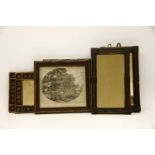 A pair of small ebonised rectangular wall mirrors in the arts and crafts style, together with a