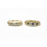 A gold sapphire and diamond five stone graduated boat shaped ring, marked 18ct and Plat, and a