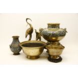 A collection of Chinese brass, including a champlevé incense burner with mask and ring handles on