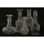 Four decanters and stoppers, 19th century with cut decoration, 26cm tallest, together with a Chinese