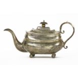 A silver teapot by T J London, 1809