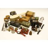 A box of miscellaneous items including tartan ware, silver sugar tongs, an ivory brush, etc.