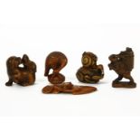 A collection of five Japanese wood carved netsuke, early 20th century, each signed