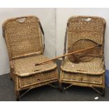 A pair of Edwardian wicker folding fishing/conservatory seats, with leather straps, and original