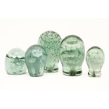 Five Victorian green glass dump weights, tallest 16.5cm