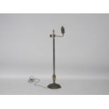 An early 20th century gilt metal standard lamp with classical motifs. 120cm high