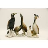 Carl Ens, birds, An ornamental crested Grebe and two Bitterns, 29cm highest (3)