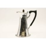 A silver hotwater jug, London 1908, 19cm high, approximately 13oz gross.