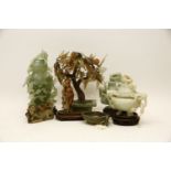 A collection of Chinese hardstone carvings, 20th century, including a bonsai, a vase and cover,