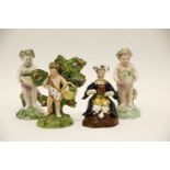 Two Derby porcelain cherubs, a child holding a basket and a Persian seated figure. Tallest 11cm. (