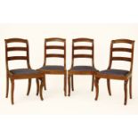 A set of four Regency style Indonesian hardwood dining chairs, the bar backs above blue water silk