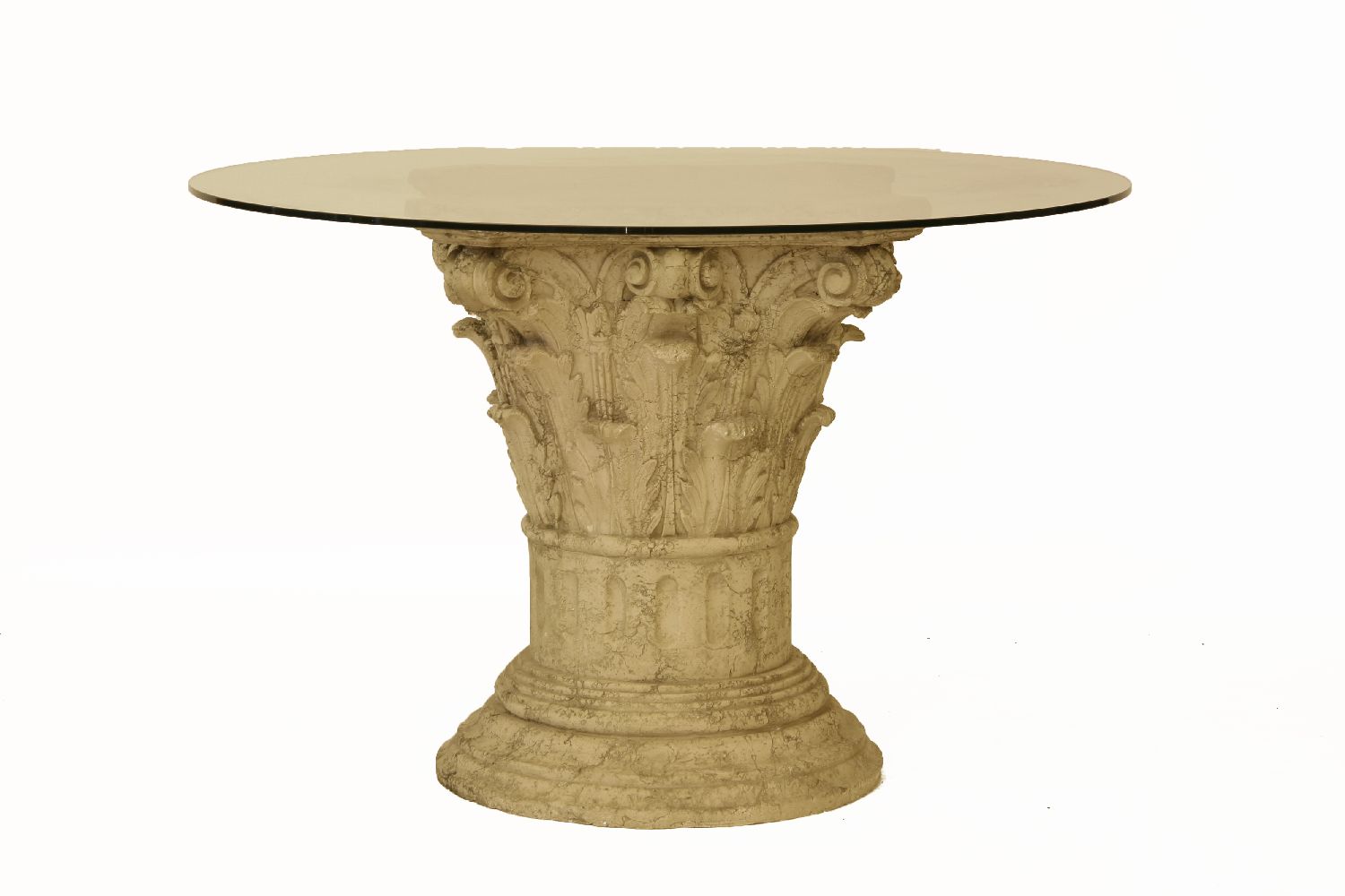 A circular composite and glass topped centre table, the base cast in the form of a Corinthian