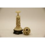 A 19th century Chinese carved ivory puzzle ball on stand